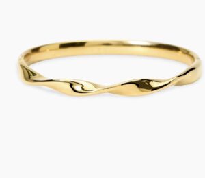 Bracciale rigido in acciaio dorato